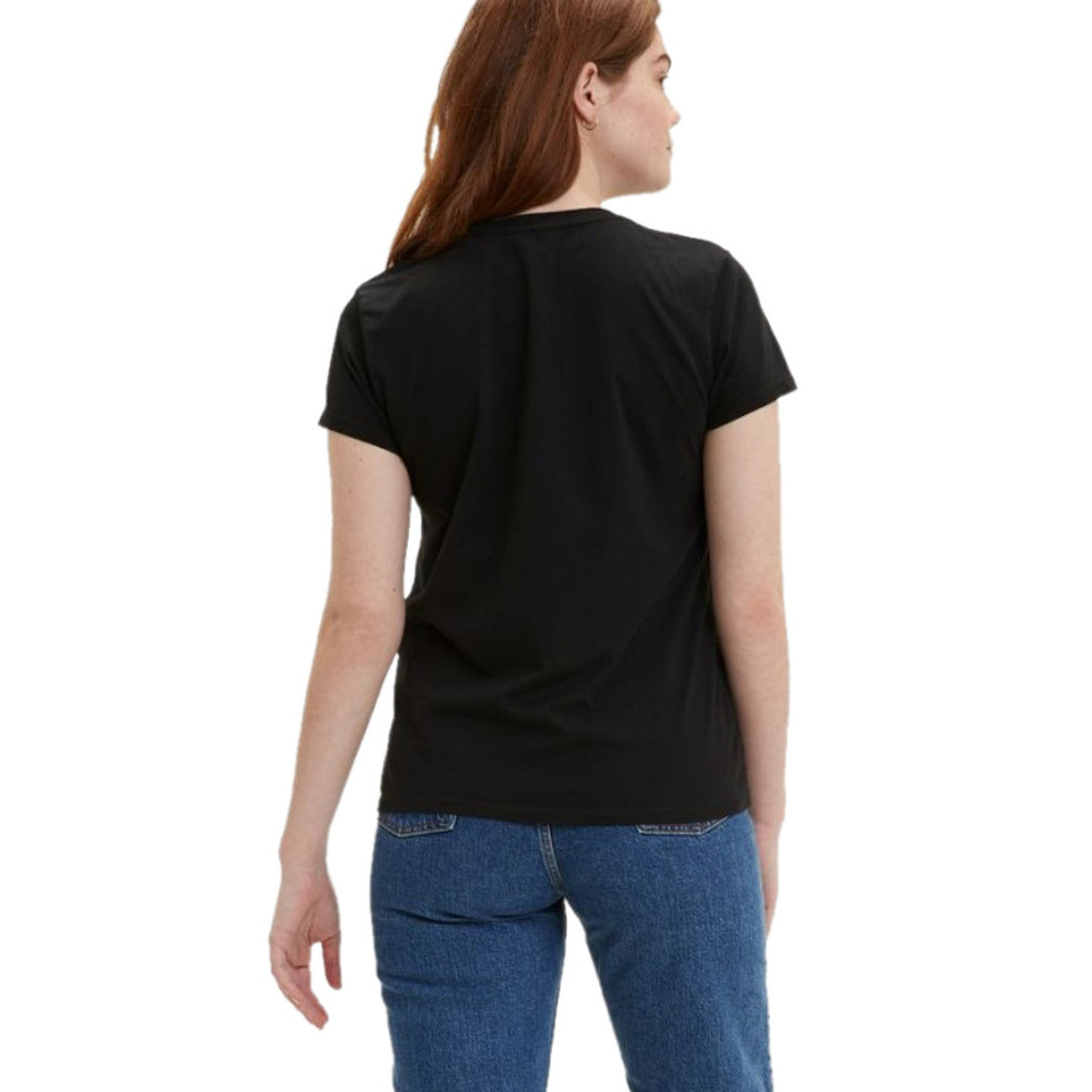 Person wearing a black t-shirt and blue jeans on a white background