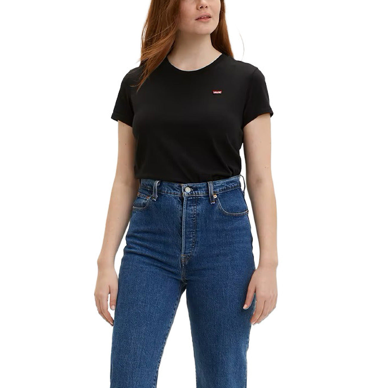 Person wearing a black t-shirt and blue jeans on a white background